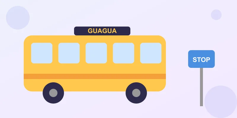 A bright city bus at a corner stop with a sign reading guagua