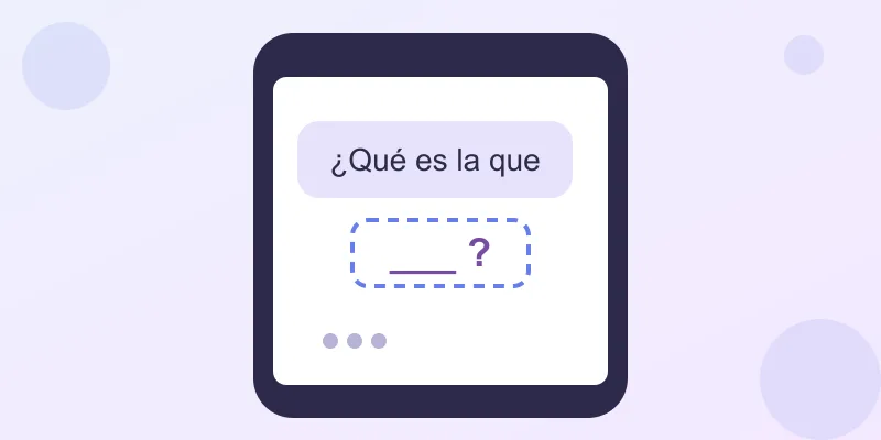A phone screen with a text bubble reading que es la que and a blank